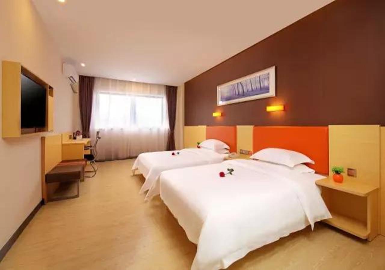 Omeiga Business Hotel Yiwu (Zhejiang) Bagian luar foto